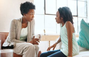 Image showing a parent and child talking. Get the facts so you can talk to kids about the risks of vaping.