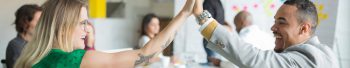 Couple high fiving. Learn more about quitting tobacco.
